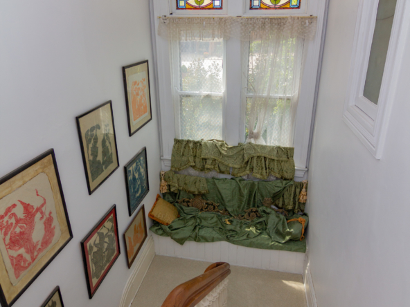 stairwell with stainglass