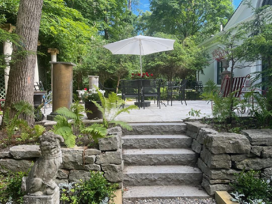 66 – stairway from parking area leading to poolhouse patio